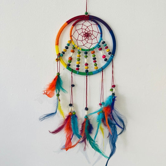 Multicoloured feather dreamcatcher with beads
