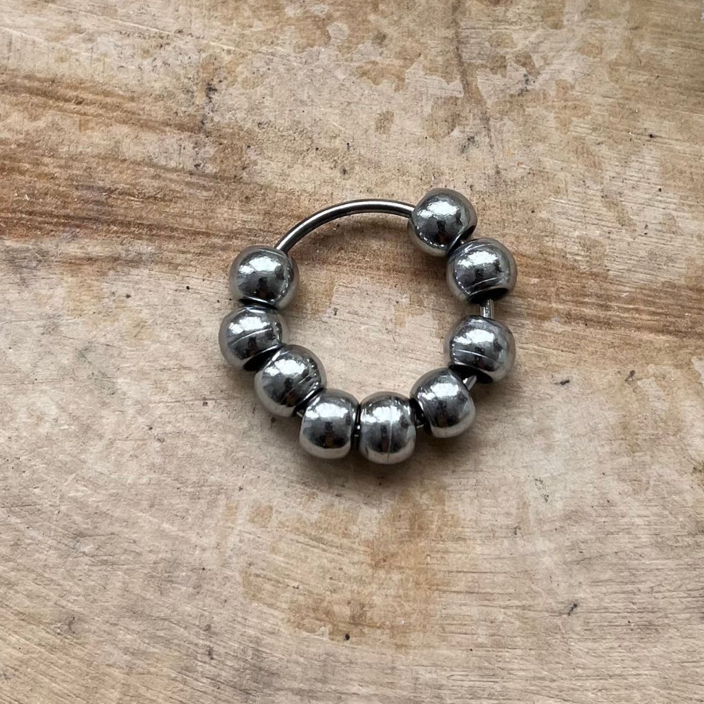 Steel mantra beaded ring